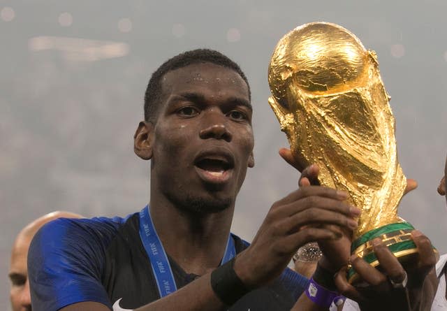 Paul Pogba with the World Cup trophy