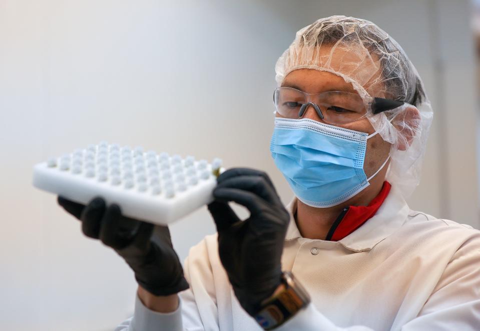 Kenneth Chen, Dragonfly vice president of business intelligence, manufactures cannabis vaporizing pods at the Dragonfly processing plant in South Salt Lake on Friday, March 24, 2023. | Kristin Murphy, Deseret News