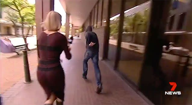 The 40-year-old runs from camera. Source: 7 News