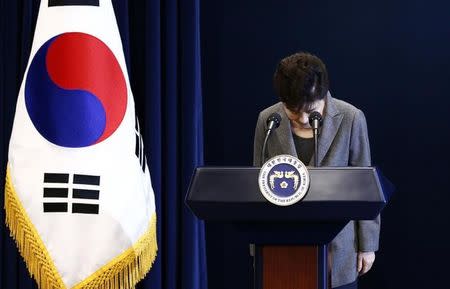 South Korean President Park Geun-Hye bows during an address to the nation, at the presidential Blue House in Seoul, South Korea, 29 November 2016. REUTERS/Jeon Heon-Kyun/Pool/Files