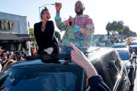 <p>John Legend and Chrissy Teigen celebrated President-elect Joe Biden's projected win with a parade of cars in West Hollywood.</p>