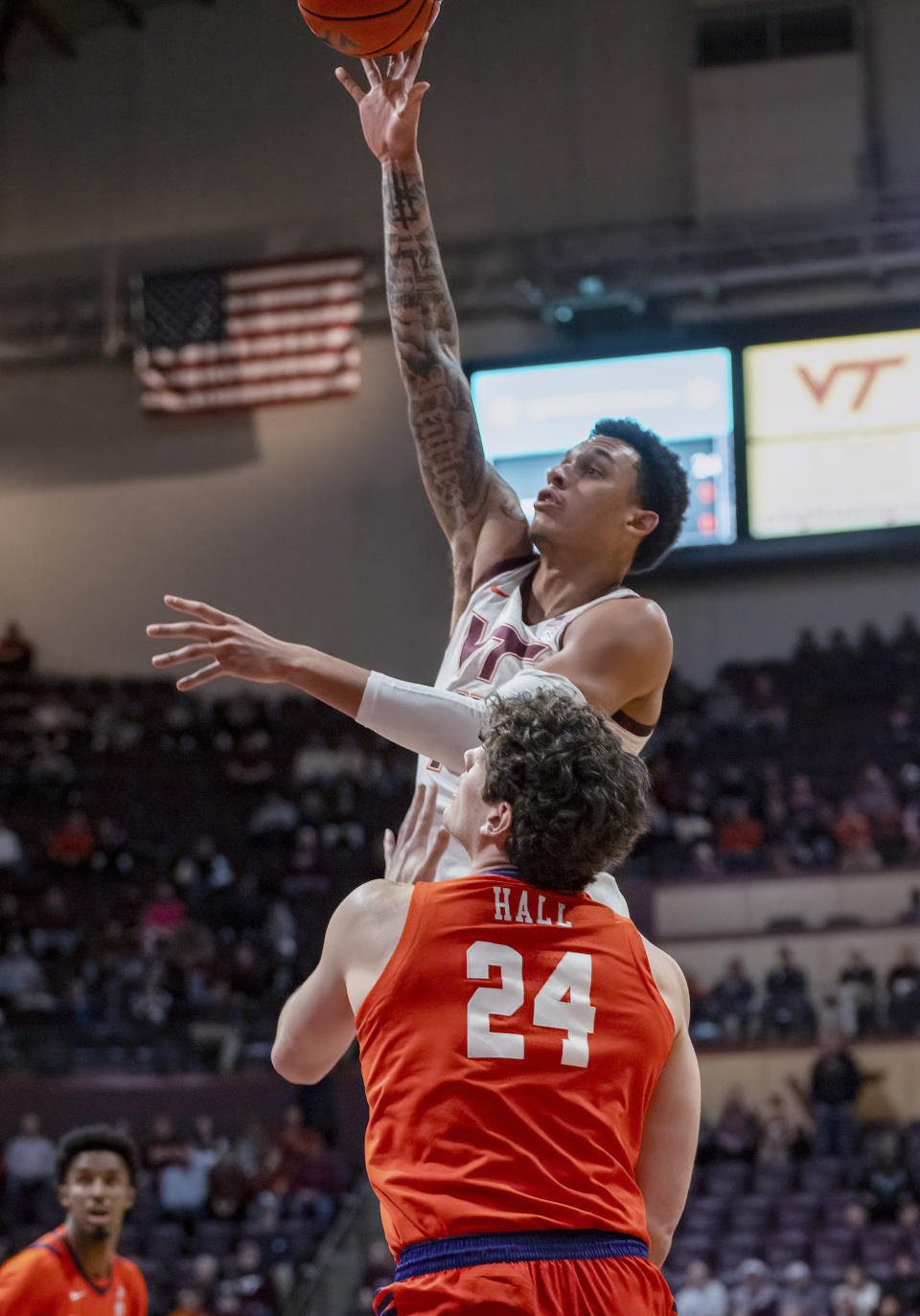Virginia Tech's Lynn Kidd shoots over Clemson's PJ Hall during the first half of an NCAA college basketball game Wednesday, Jan. 10, 2024, in Blacksburg, Va. (AP Photo/Robert Simmons)