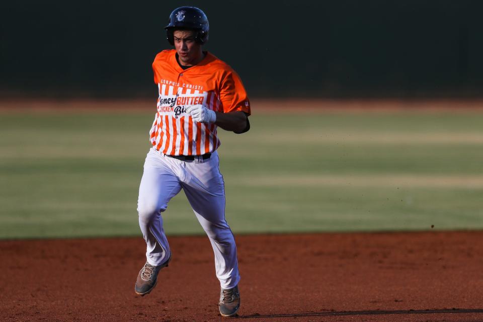 Hooks shortstop Shay Whitcomb (16) runs to third base in a game against Northwest Arkansas at Whataburger Field in Corpus Christi, Texas on Wednesday, July 13, 2022. The Hooks won 10-3.