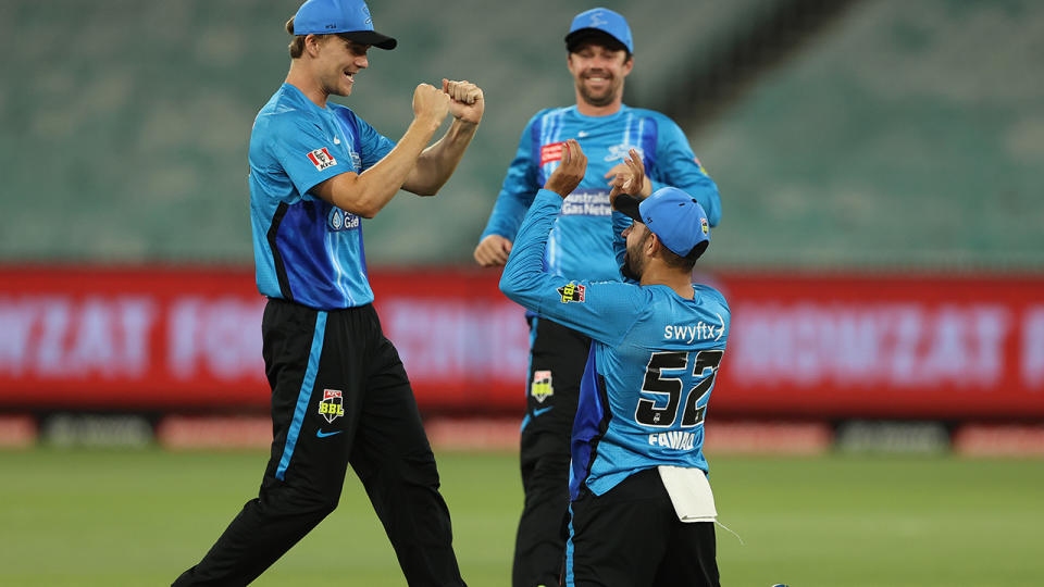 Fawad Ahmed, pictured here celebrating after his controversial catch to dismiss Usman Khawaja. 