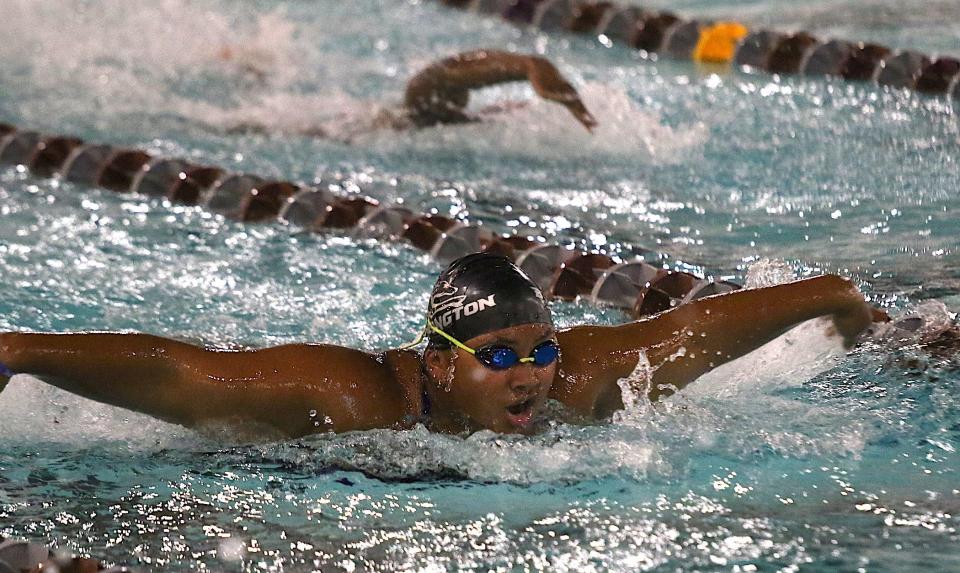 Burlington’s Amari Bailey swims the butterfly leg of the 200-yard medley during a recent meet