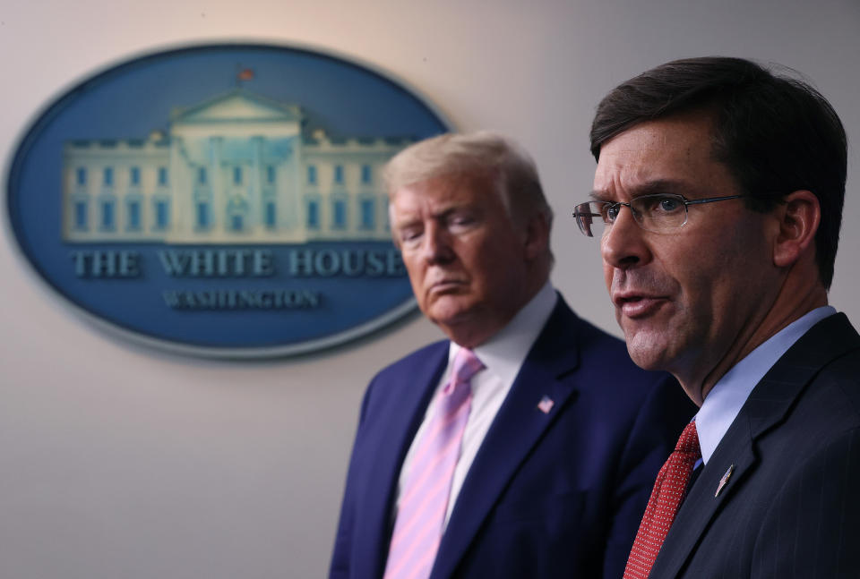 WASHINGTON, DC - APRIL 01: Secretary of Defense Mark Esper speaks as U.S. President Donald Trump listens during the daily White House coronavirus press briefing April 1, 2020 in Washington, DC. After announcing yesterday that COVID-19 could kill between 100,000 and 240,000 Americans, the Trump administration is also contending with the economic effects of the outbreak as the stock market continues to fall, businesses remain closed, and companies lay off and furlough employees. (Photo by Win McNamee/Getty Images)