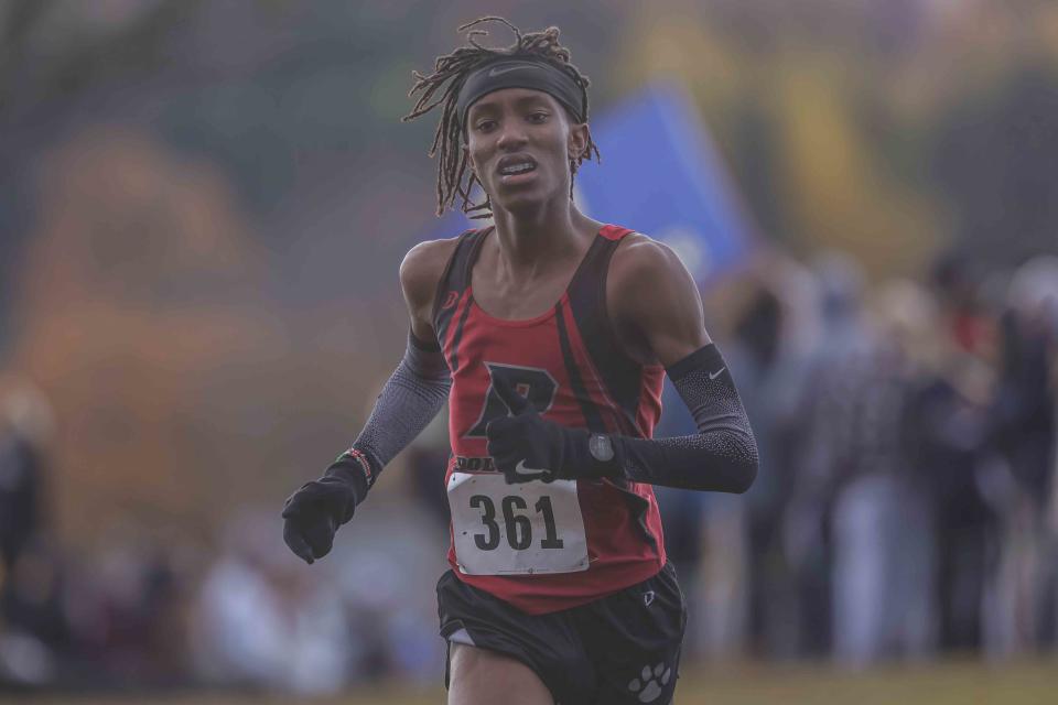 Matt Gatune of Polytech runs in the Division I boys race at the DIAA Cross Country Championships in 2021.