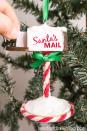 <p>This may not be the kind of mailbox you stick in front of your house, but it's so adorbs we couldn't resist including it. The door even opens, making it extra holly jolly.</p><p><strong>Get the the tutorial at <a href="https://www.triedandtrueblog.com/santas-mailbox-ornament-tutorial/" rel="nofollow noopener" target="_blank" data-ylk="slk:Tried and True Creative;elm:context_link;itc:0;sec:content-canvas" class="link ">Tried and True Creative</a>.</strong></p><p><a class="link " href="https://www.amazon.com/Apple-Barrel-Acrylic-Assorted-2-Ounce/dp/B005WWG0D2/ref=asc_df_B005WWG0D2/?tag=syn-yahoo-20&ascsubtag=%5Bartid%7C10050.g.33605249%5Bsrc%7Cyahoo-us" rel="nofollow noopener" target="_blank" data-ylk="slk:SHOP WHITE ACRYLIC PAINT;elm:context_link;itc:0;sec:content-canvas">SHOP WHITE ACRYLIC PAINT</a><strong><br></strong></p><p><strong>RELATED:</strong><strong> <a href="https://www.countryliving.com/diy-crafts/how-to/g1070/easy-to-make-christmas-ornament-crafts/" rel="nofollow noopener" target="_blank" data-ylk="slk:75 DIY Christmas Ornaments Your Family Will Treasure for Years;elm:context_link;itc:0;sec:content-canvas" class="link ">75 DIY Christmas Ornaments Your Family Will Treasure for Years</a></strong></p>