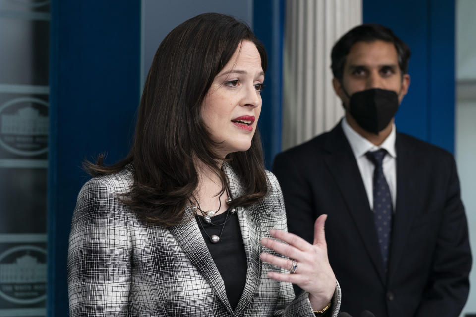 Anne Neuberger, Deputy National Security Advisor for Cyber and Emerging Technology, accompanied by Daleep Singh, Deputy National Security Advisor for International Economics, speaks with reporters in the James Brady Press Briefing Room at the White House, Friday, Feb. 18, 2022, in Washington. (AP Photo/Alex Brandon)