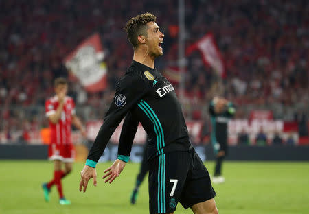 Soccer Football - Champions League Semi Final First Leg - Bayern Munich vs Real Madrid - Allianz Arena, Munich, Germany - April 25, 2018 Real Madrid's Cristiano Ronaldo reacts after his goal is disallowed for handball REUTERS/Michael Dalder