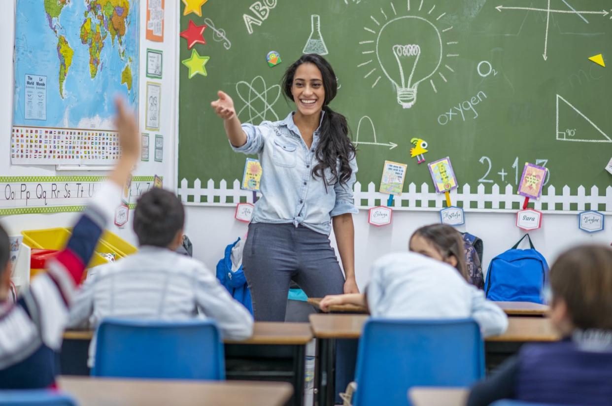 <span class="caption">Today's science standards encourage teachers to base lessons on real-world phenomena rather than textbook facts and definitions.</span> <span class="attribution"><a class="link " href="https://www.gettyimages.com/detail/photo/students-answering-a-question-royalty-free-image/1134338121" rel="nofollow noopener" target="_blank" data-ylk="slk:FatCamera/E+ Collection via Getty Images;elm:context_link;itc:0;sec:content-canvas">FatCamera/E+ Collection via Getty Images</a></span>