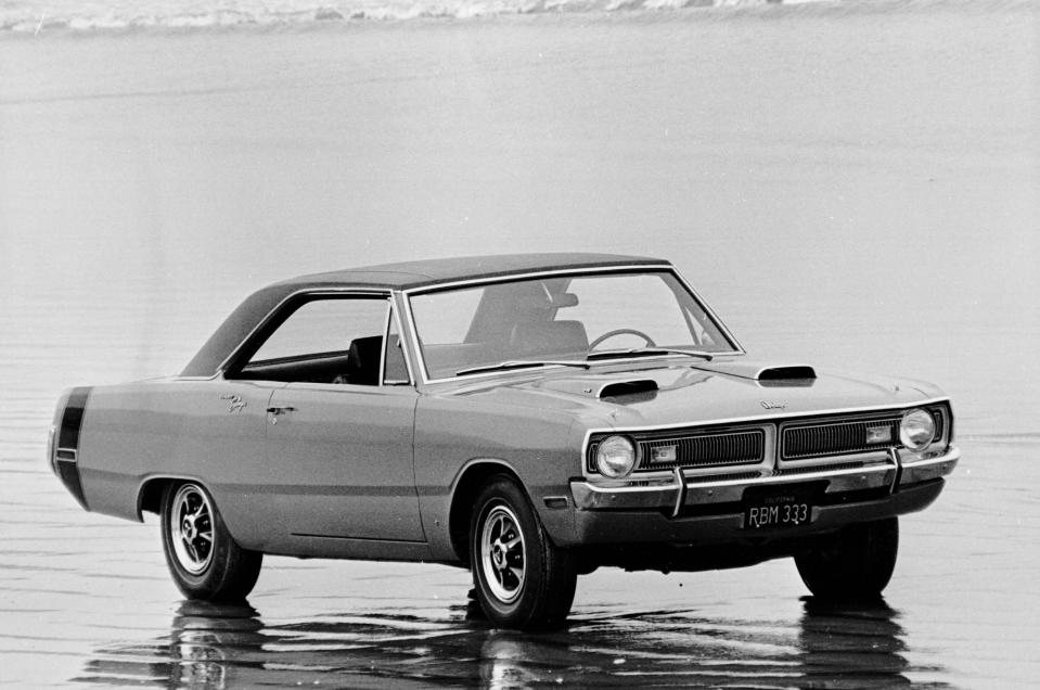 FILE- This undated file photo provided by Chrysler Group LLC, shows a 1970 Dodge Dart Swinger, with a 340-cubic-inch V-8 engine. Middle-class Americans bought nearly 3.3 million Dodge Darts between 1960 and 1976. After a 36-year hiatus, Chrysler is counting on the new, reinvented Dart, which debuted at the Detroit auto showin January 2012, to continue its recent revival. (AP Photo/Chrysler Group LLC)