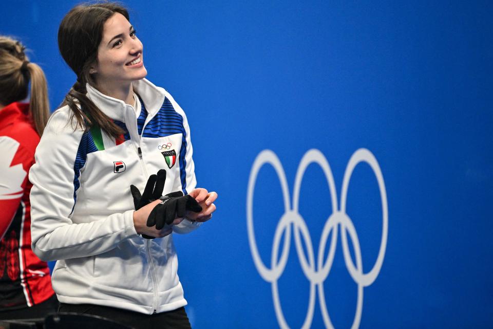 Italy's Stefania Constantini reacts after the mixed doubles round robin session 13 game of the Beijing 2022 Winter Olympic Games curling competition between Canada and Italy (AFP via Getty Images)