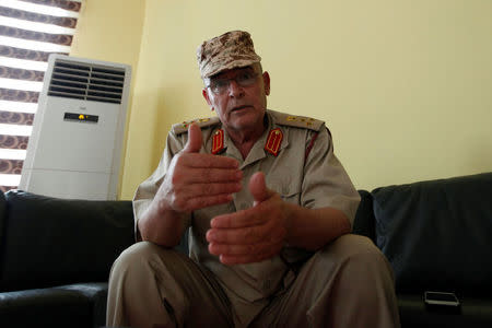 Brigadier General Mohamed al-Gasri, spokesman for a newly formed military operations room in Misrata, gestures as he speaks during an interview with Reuters in Misrata, Libya May 10, 2016. REUTERS/Ismail Zitouny