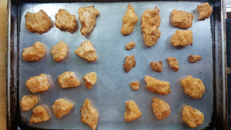 Chicken chunks on oven tray