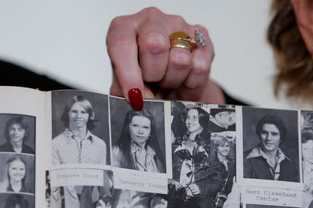 Accuser Beverly Young Nelson points to a photograph of herself in her high school yearbook after making a statement claiming that Alabama senate candidate Roy Moore sexually harassed her when she was 16, in New York, U.S., November 13, 2017. REUTERS/Lucas Jackson