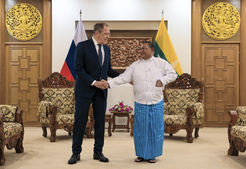 In this handout photo released by the Russian Foreign Ministry Press Service, Myanmar Foreign Minister Wunna Maung Lwin, right, and Russian Foreign Minister Sergey Lavrov pose for a photo prior to their talks in Naypyitaw, Myanmar, Wednesday, Aug. 3, 2022. (Russian Foreign Ministry Press Service via AP)