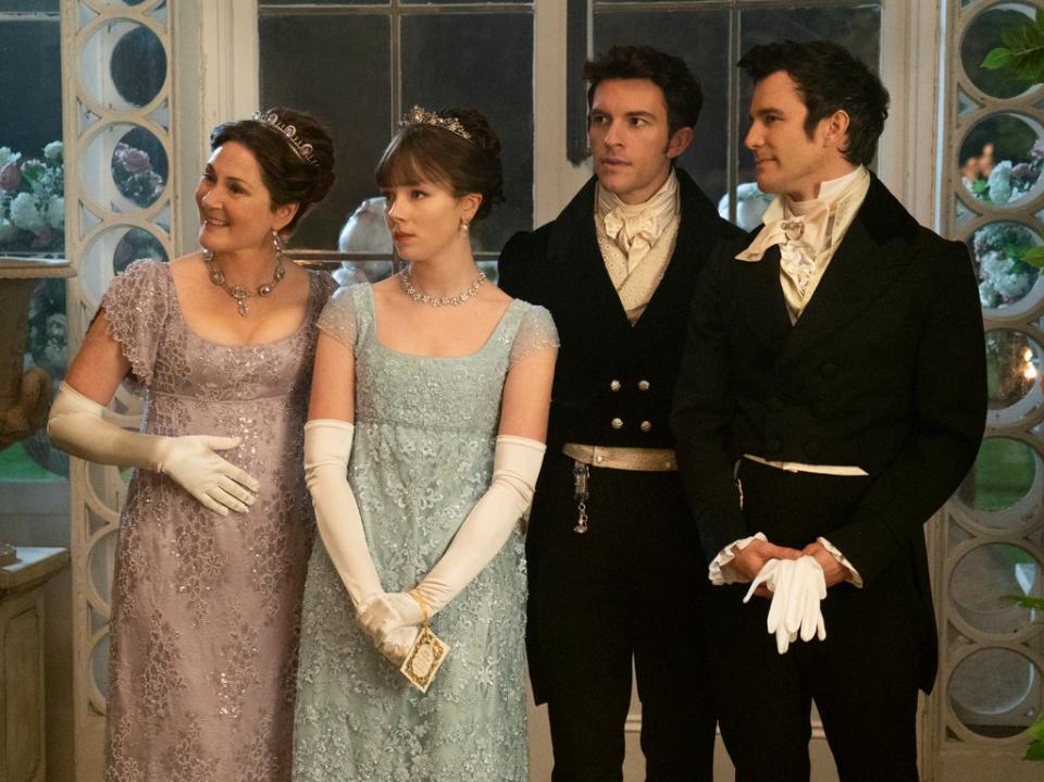 Ruth Gemmell as Lady Violet Bridgerton, Claudia Jessie as Eloise Bridgerton, Jonathan Bailey as Anthony Bridgerton, and Luke Thomspon as Benedict Bridgerton in season two (LIAM DANIEL/NETFLIX)