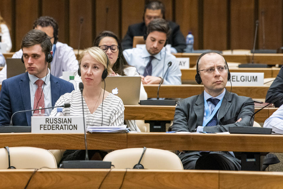 Russian diplomats including Boris Bondarev (right with glasses)