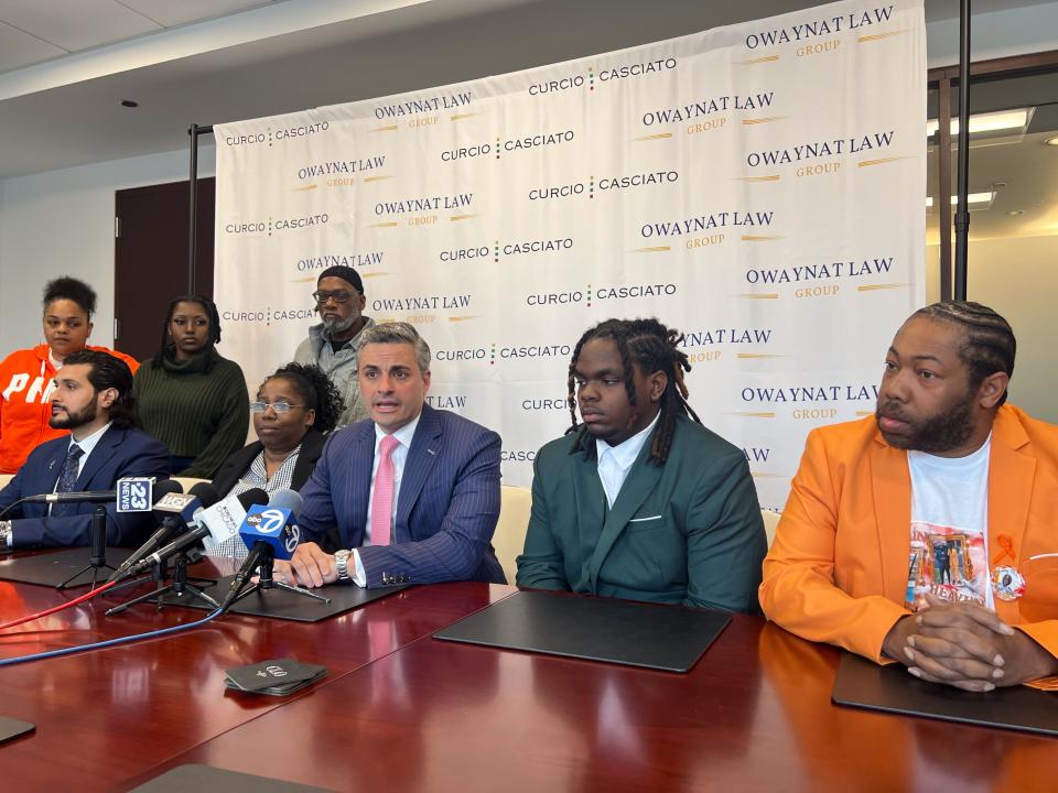 The family of Jason Jenkins, along with its attorneys, announce a lawsuit against Walmart and a security company for their alleged role in Jenkins' stabbing death on March 24, 2024 at a Rockford Walmart. Pictured on Thursday, April 11, 2024, in Chicago, are, seated from left, attorney Mohammad Owaynat of the Owaynat Law Group, Jason Jenkins' mother Nila Jenkins, attorney Jack J. Casciato of Curcio & Casciato Attorneys, Jason Jenkins' brother Jasper Jenkins and family friend Patrick DuBose.