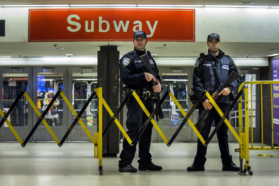 <em>Police stand guard inside the Port Authority Bus Terminal following the Times Square explosion (AP)</em>