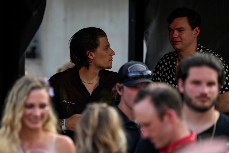 Actor Jake Bongiovi watches from a VIP tent before Taylor Swift performs Friday night at Paycor Stadium.