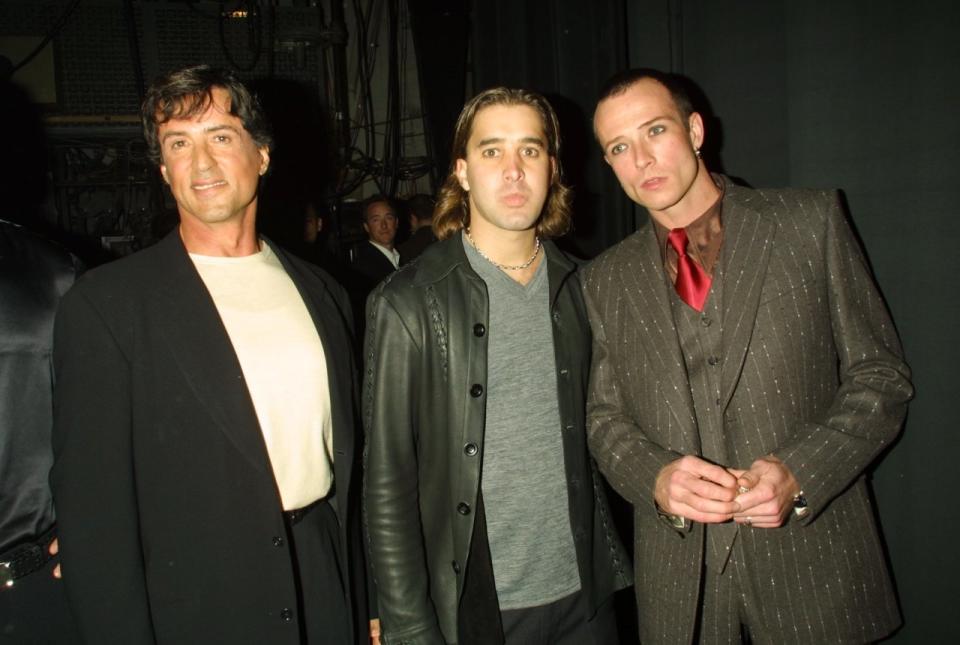 He posed with Rocky and Creed (well, Sylvester Stallone and Creed singer Scott Stapp) at the My VH1 Music Awards in 2000. (Kevin Mazur)