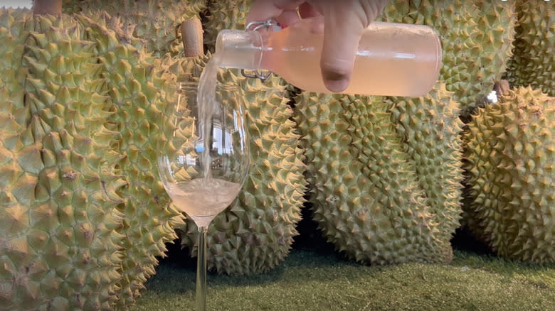 Durian wine poured into glass