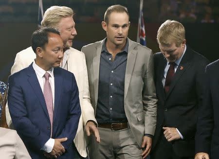 Tennis - Australian Open - Melbourne Park, Melbourne, Australia - 24/1/17 Former tennis player Andy Roddick of the U.S. stands with former tennis players Michael Chang of the U.S., Germany's Boris Becker, Jim Courier of the U.S, during his induction ceremony into the International Tennis Hall of Fame. REUTERS/Issei Kato