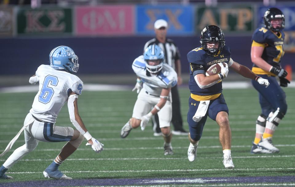Stephenville's Tate Maruska (17) gets his team closer to the end zone late in the first half against China Spring. Stephenville beat the Cougars 31-21 in the District 5-4A Division I game Thursday at Tarleton Memorial Stadium in Stephenville.