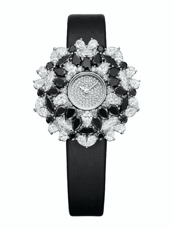 <p>Exquisite pear-cut spinels and white diamonds, paired with a black satin strap, elevate a simple watch into a work of art. </p><p>Black spinel and diamond high jewellery watch, price on request, Harry Winton</p><p><a class="link " href="https://www.cartier.co.uk/" rel="nofollow noopener" target="_blank" data-ylk="slk:ENQUIRE NOW;elm:context_link;itc:0;sec:content-canvas">ENQUIRE NOW</a></p>