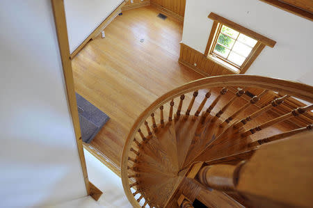 A spiral staircase leads to a loft and overlooks a room in the train station at Michael Jackson's Neverland Ranch in Los Olivos, California July 3, 2009. REUTERS/Phil Klein