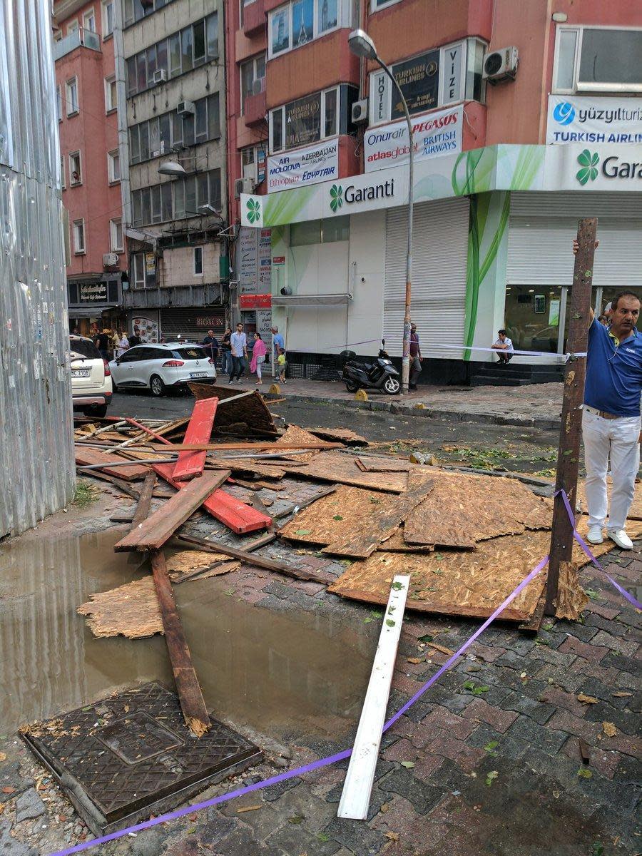 Debris has fallen off buildings during the freak storm in the Turkish capital (Edouard Benadava)