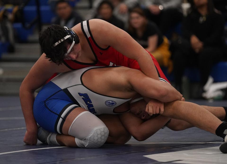 Pearl RiverÕs Nick Espinal wrestles Tappan ZeeÕs Cam Keeperman in the 215-pound championship match at the Rockland County Wrestling Championships at Suffern High School on Saturday, Jan. 20, 2024.