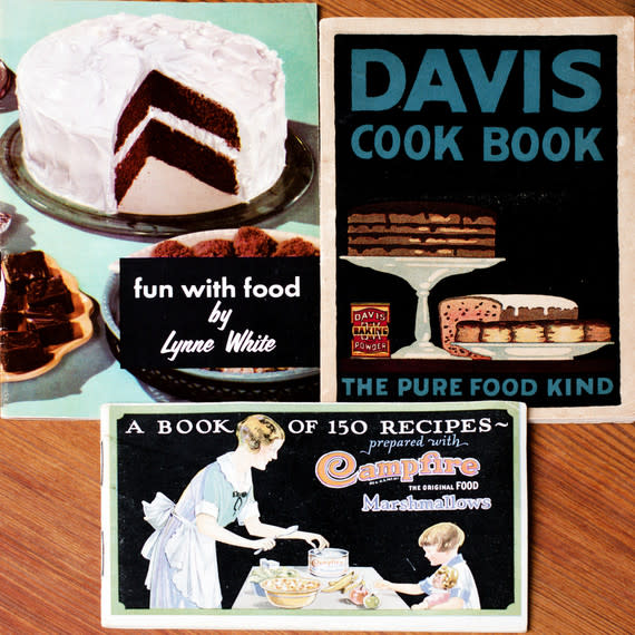 Clockwise from top left: Fun with Food by Lynn White, 1957 (Durkee-Mower); Davis Cook Book, 1904 (RB Davis Company); A Book of 150 Recipes Prepared with Campfire Marshmallows, 1928 (Doumak Inc.). | Spencer Staats
