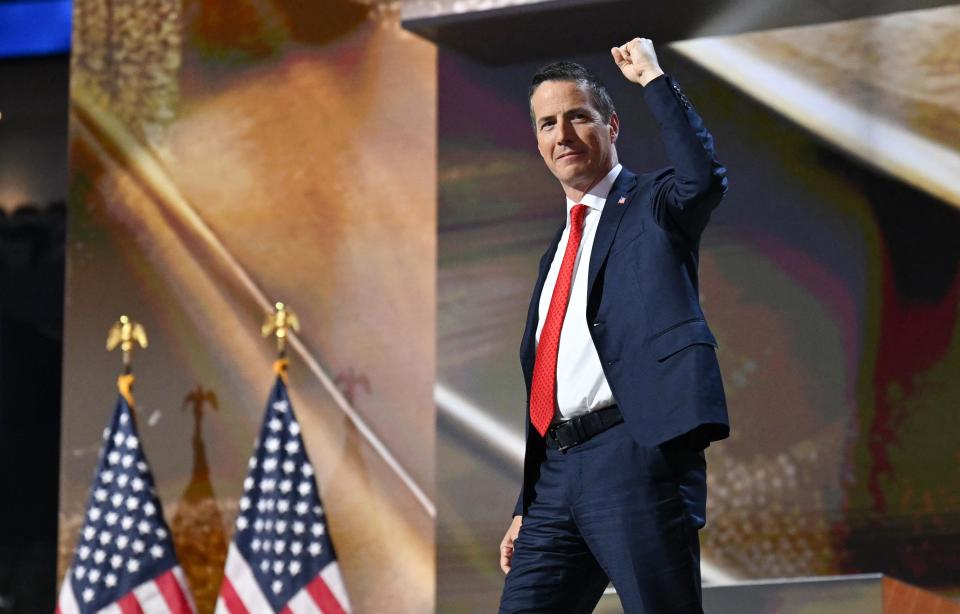 Colombian-US businessman Bernie Moreno gestures as he arrives onstage to speak during the second day of the 2024 Republican National Convention at the Fiserv Forum in Milwaukee, Wisconsin, July 16, 2024.