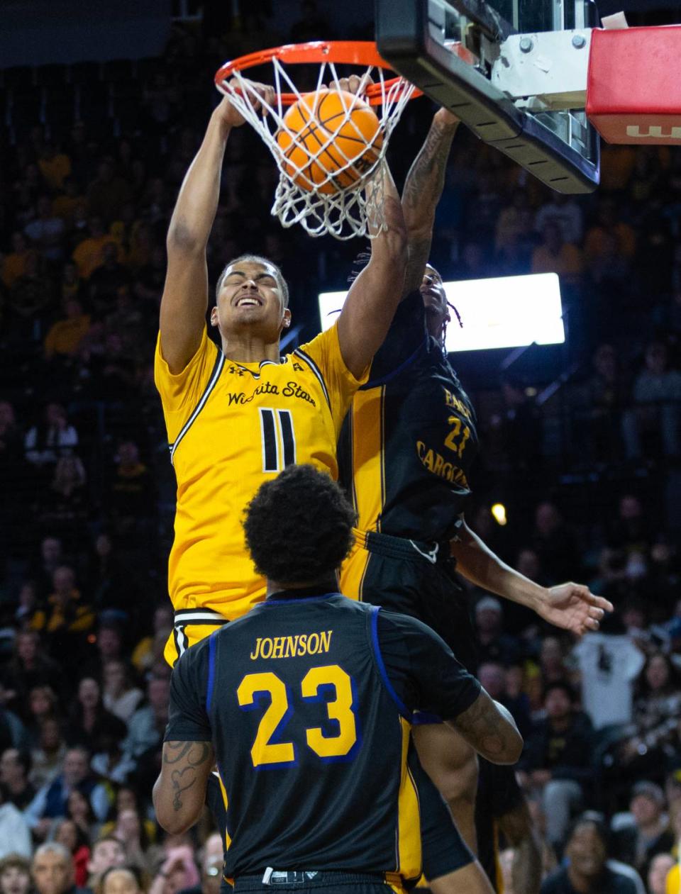 Wichita State’s Kenny Pohto dunks the ball during the second half of their 79-69 loss to East Carolina on Saturday at Koch Arena. Travis Heying/The Wichita Eagle