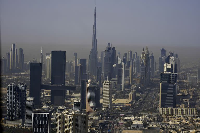 The skyline of Dubai, United Arab Emirates, with the world's tallest building the Burj Khalifa, is seen Friday, May 19, 2023. (AP Photo/Jon Gambrell)