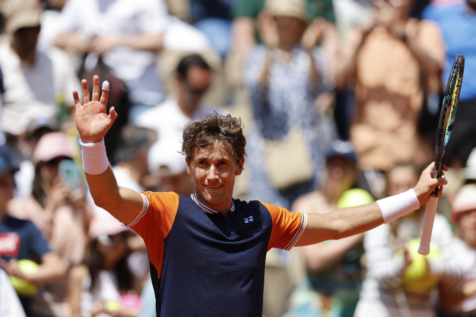 Norway's Casper Ruud celebrates winning his first round match of the French Open tennis tournament against Sweden's Elias Ymer in three sets, 6-4, 6-3, 6-2, at the Roland Garros stadium in Paris, Tuesday, May 30, 2023. (AP Photo/Jean-Francois Badias)