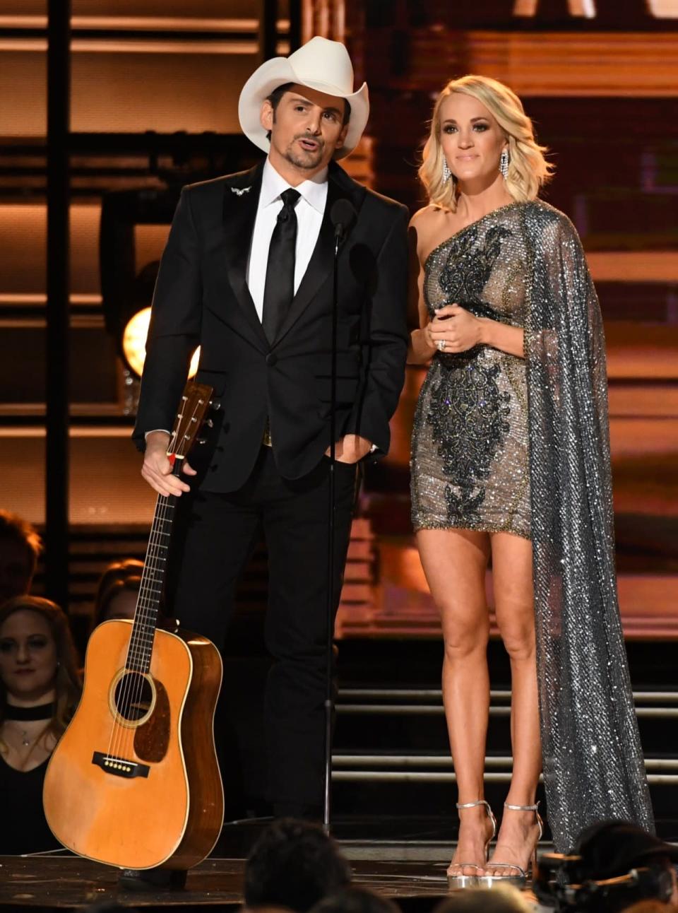 Carrie Underwood’s metallic mini dress featured a shoulder train