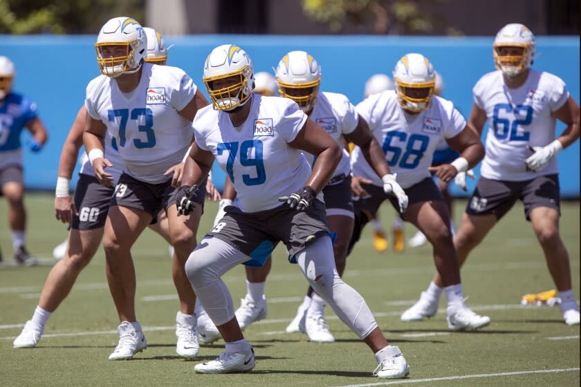 Los Angeles Chargers offensive tackle Trey Pipkins III (79) takes part in drills at the NFL.