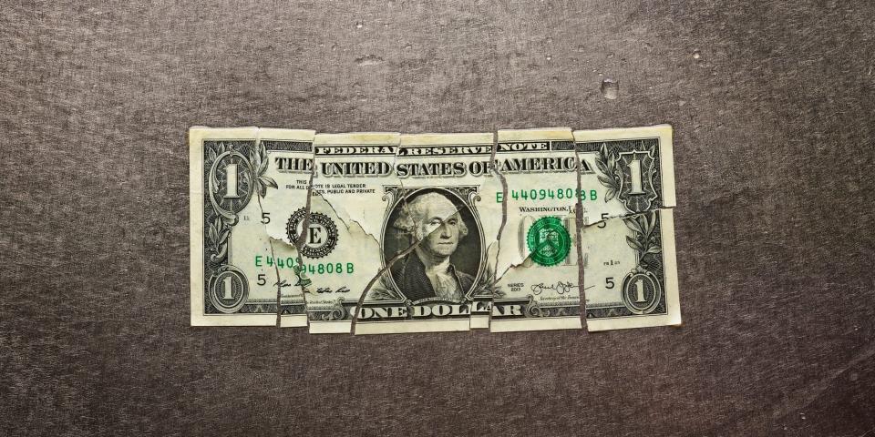 Broken dollar bill