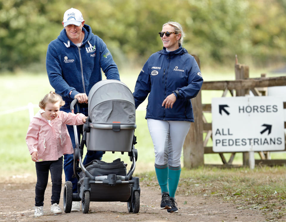 STROUD, UNITED KINGDOM - SEPTEMBER 09: (EMBARGOED FOR PUBLICATION IN UK NEWSPAPERS UNTIL 24 HOURS AFTER CREATE DATE AND TIME) Mike Tindall and Zara Tindall with their daughters Mia Tindall and Lena Tindall (in her pram) attend day 3 of the Whatley Manor Horse Trials at Gatcombe Park on September 9, 2018 in Stroud, England. (Photo by Max Mumby/Indigo/Getty Images)