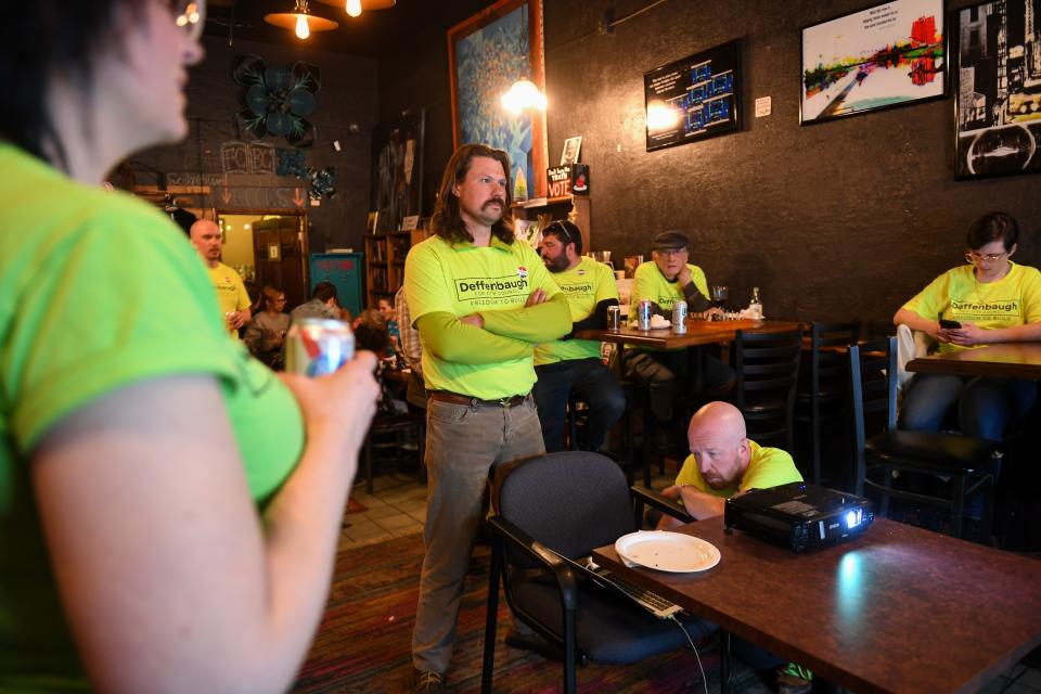 City council candidate Jordan Deffenbaugh watches the results of the votes on Tuesday, April 9, 2024, at Full Circle Book Co-op in Sioux Falls.