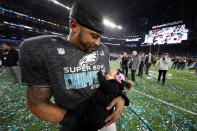<p>Najee Goode #52 of the Philadelphia Eagles celebrates with his family after defeating the New England Patriots 41-33 in Super Bowl LII at U.S. Bank Stadium on February 4, 2018 in Minneapolis, Minnesota. (Photo by Patrick Smith/Getty Images) </p>