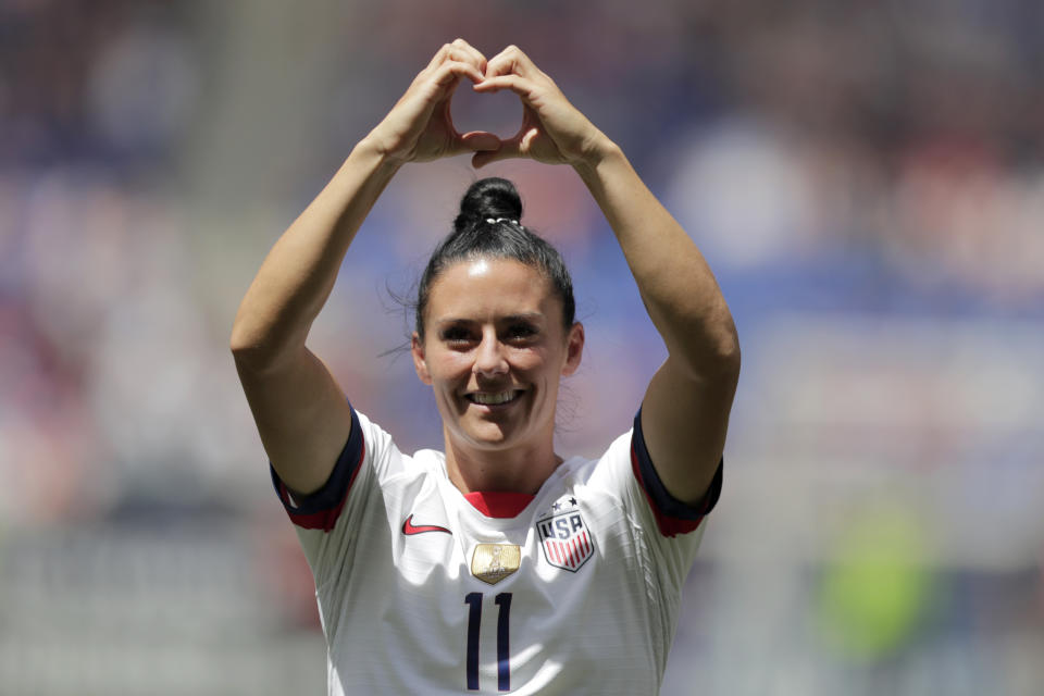 Ali Krieger, a defender for the United States women's national team which is headed to the FIFA Women's World Cup, is introduced to fans during a send-off ceremony following an international friendly soccer match against Mexico, Sunday, May 26, 2019, in Harrison, N.J. (AP Photo/Julio Cortez)