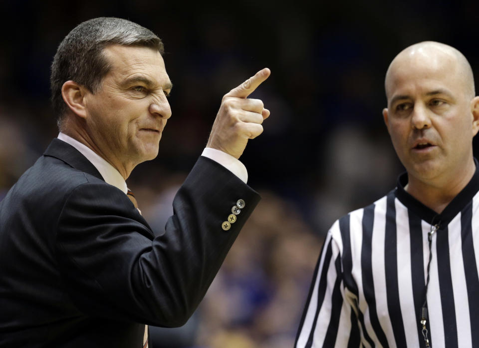 Maryland coach Mark Turgeon yells at an official during the first half of an NCAA college basketball game against Duke in Durham, N.C., Saturday, Feb. 15, 2014. Duke won 69-67. (AP Photo/Gerry Broome)