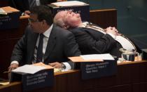 RNPS - PICTURES OF THE YEAR 2013 - Toronto Mayor Rob Ford laughs during council beside councillor Giorgio Mammoliti at City Hall in Toronto November 14, 2013. Embattled mayor Ford, under huge pressure to quit after he admitted smoking crack cocaine, said then that he was getting help for a drinking problem, but offered no indication that he might step down. Ford also expressed remorse for an obscene outburst he made earlier in the day when denying an allegation he had made sexual overtures to a female member of his staff. REUTERS/Mark Blinch (CANADA - Tags: POLITICS CRIME LAW TPX)