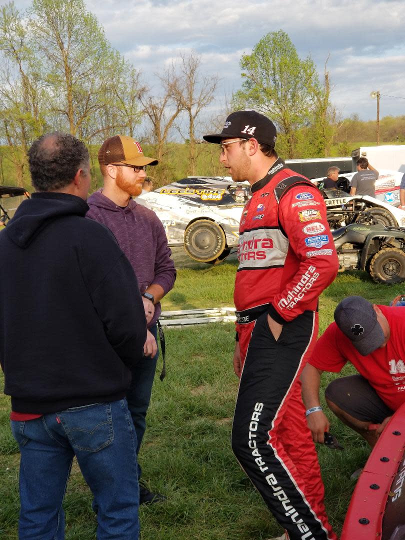 Mitchell's Chase Briscoe (right) greeted hundreds of friends, family and fans Wednesday night at Brownstown Speedway.