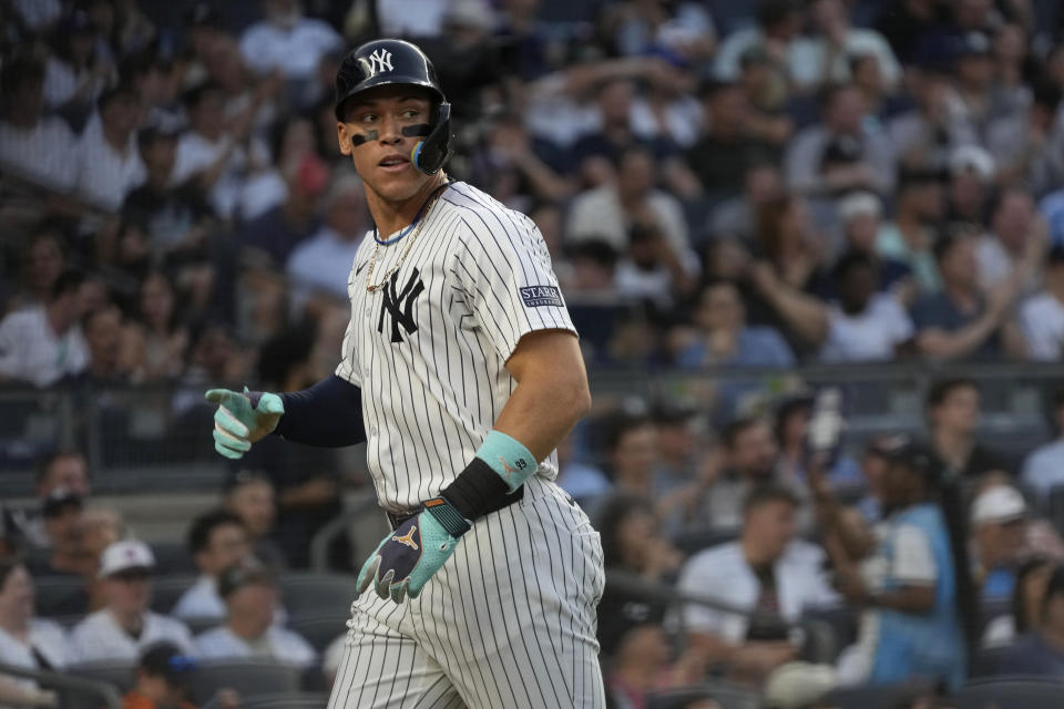 New York Yankees' Aaron Judge scores during the third inning of a baseball game against the Baltimore Orioles, Tuesday, June 18, 2024, in New York. (AP Photo/Pamela Smith)